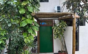 Quarto com banho privado e lavanderia